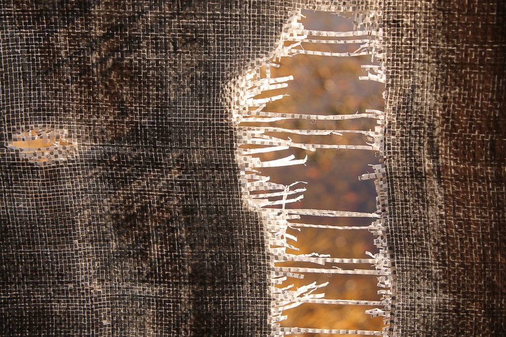 frayed material symbolizing stress of divorce