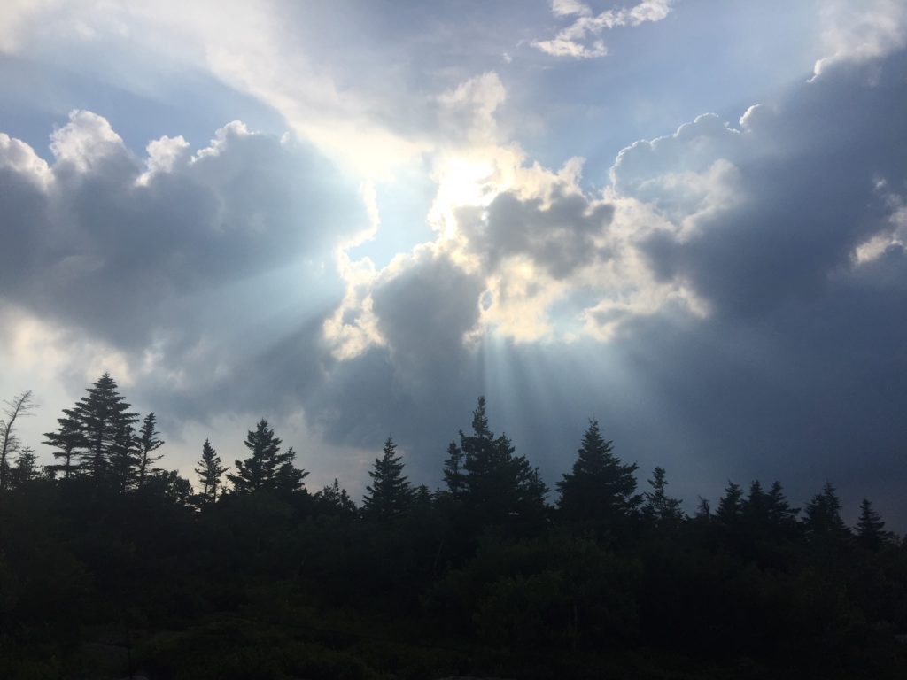 glorifying God - clouds with sun rays